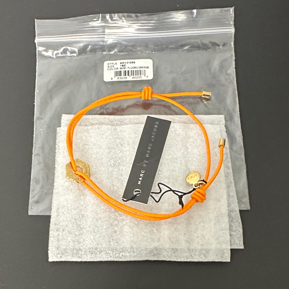 Marc Jacobs NWT Vibrant Orange Adjustable Slide Bracelet with Gold Accents